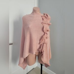 Pink poncho with ruffles